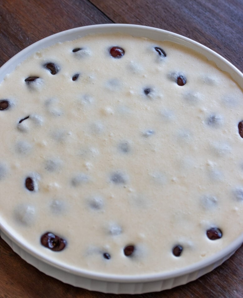 custard over cherries for the clafoutis