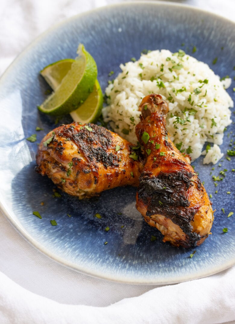 chicken drumstick on a blue serving plate