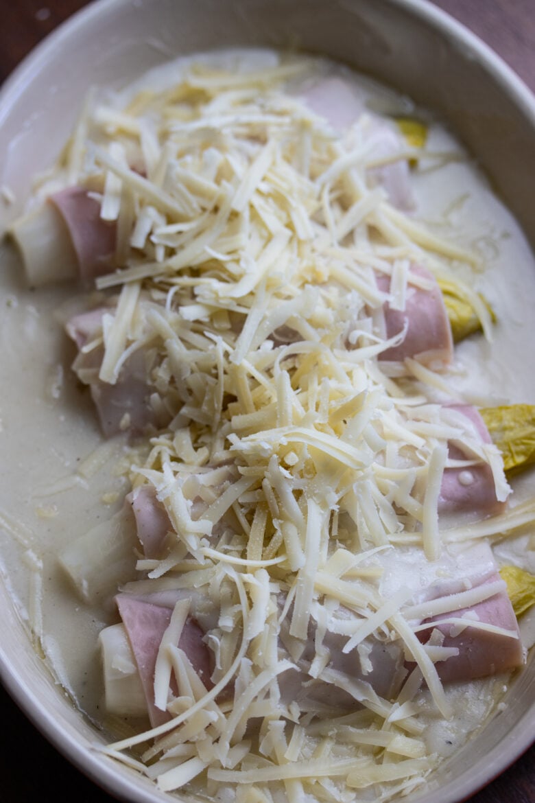 Endive Ham Gratin woith grated cheese over it prior to going in the oven