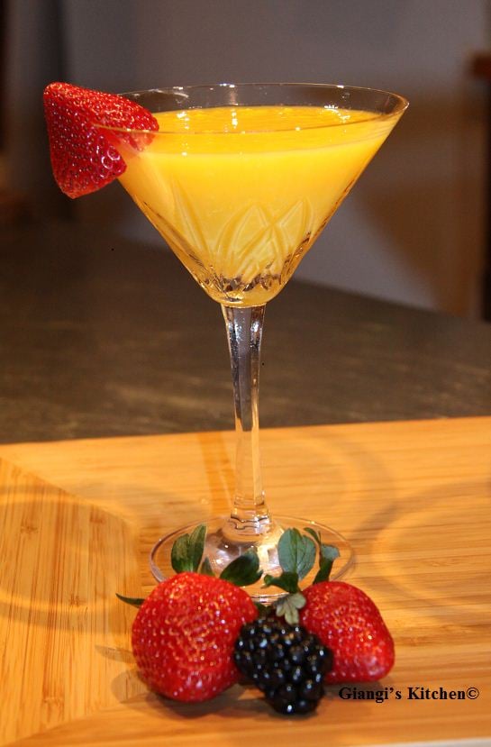 mango martini cocktail  served in a crystal glass