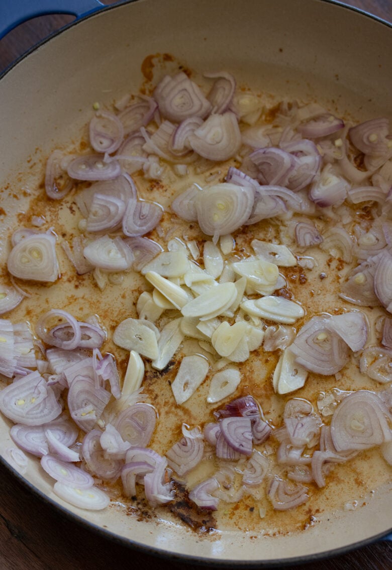 shallots and garlic in skillet befgore cooking