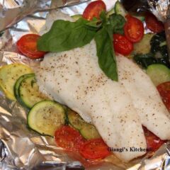 Orange roughy packets with vegetables