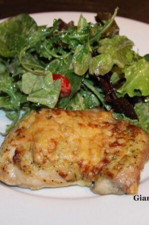 Pecorino crusted chicken with arugula and mixed baby green salad