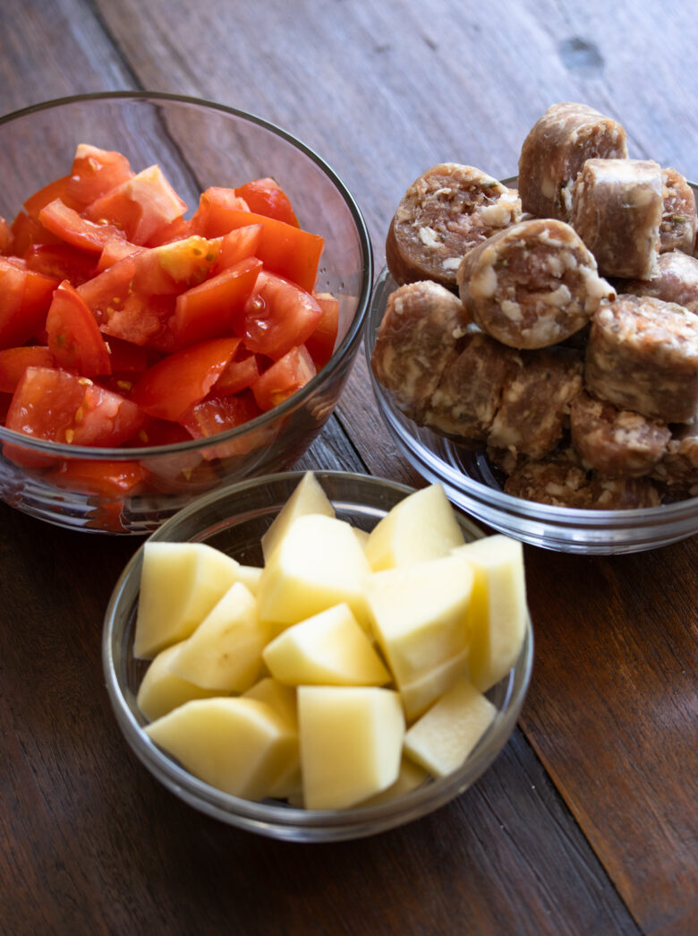 tomatoes, sausage and potatoes chopped and cut up