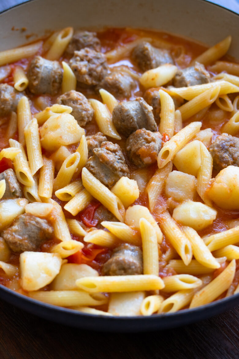 Penne Pasta with Sausage and Tomatoes Ingredients in skillet