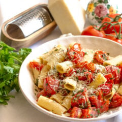 rigatoni with roasted tomato on a serving dish