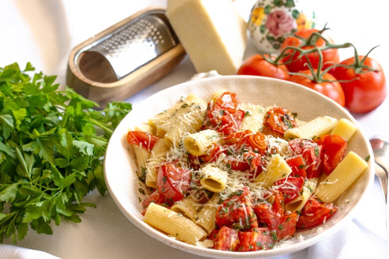 rigatoni with roasted tomato on a serving dish