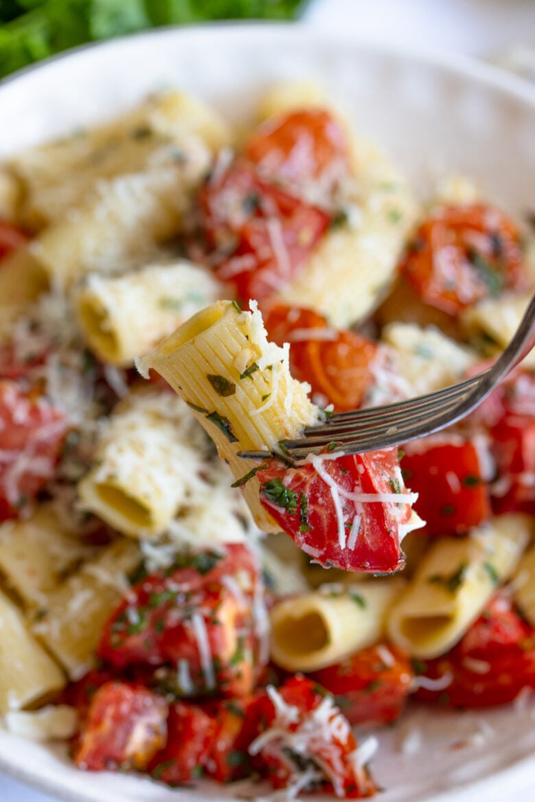 rigatoni with roasted tomato on a fork