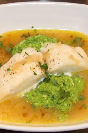 lemon soup with pea puree and sea bass