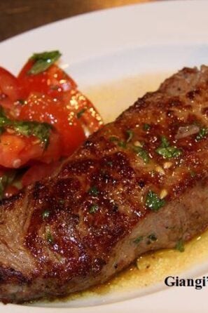 Steak with tomato salad