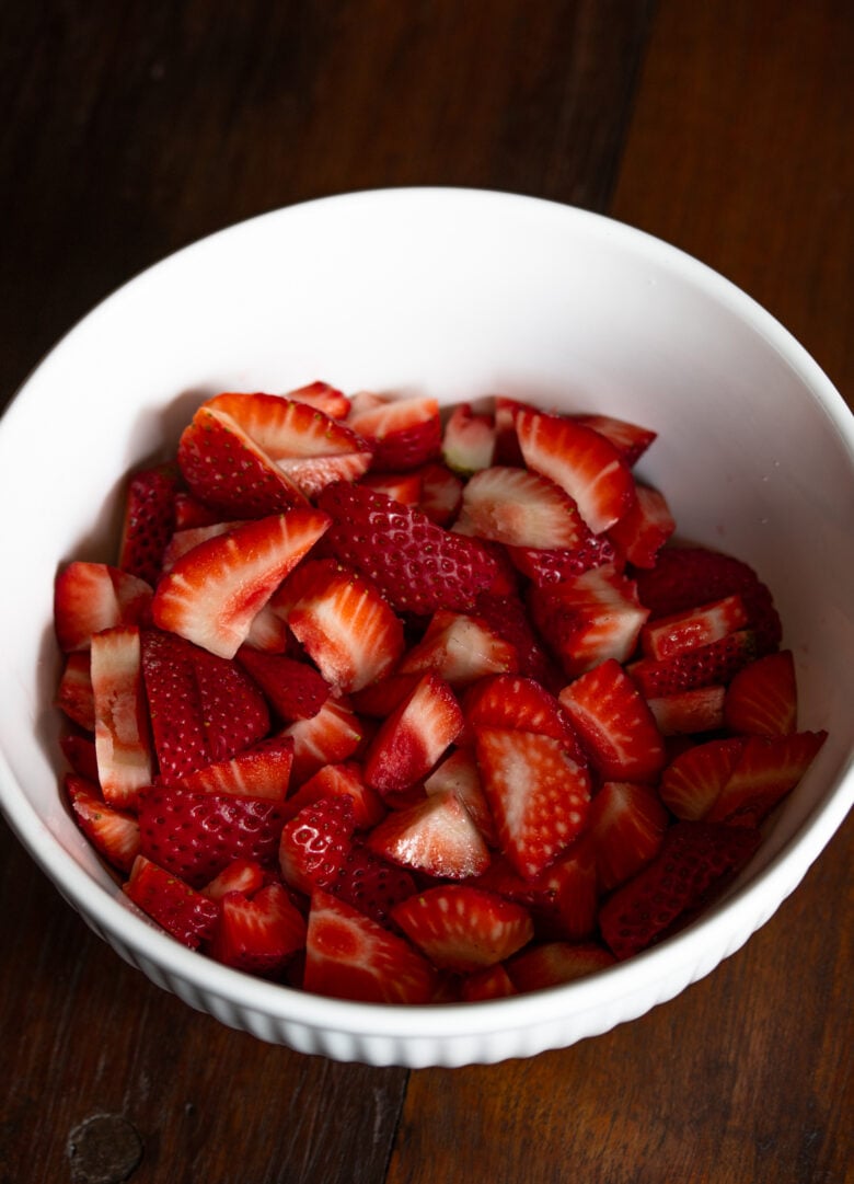 Strawberry in Wine cut into slices and placed in a container