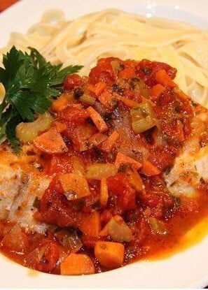 swordfish with tomatoes, carrots and celery