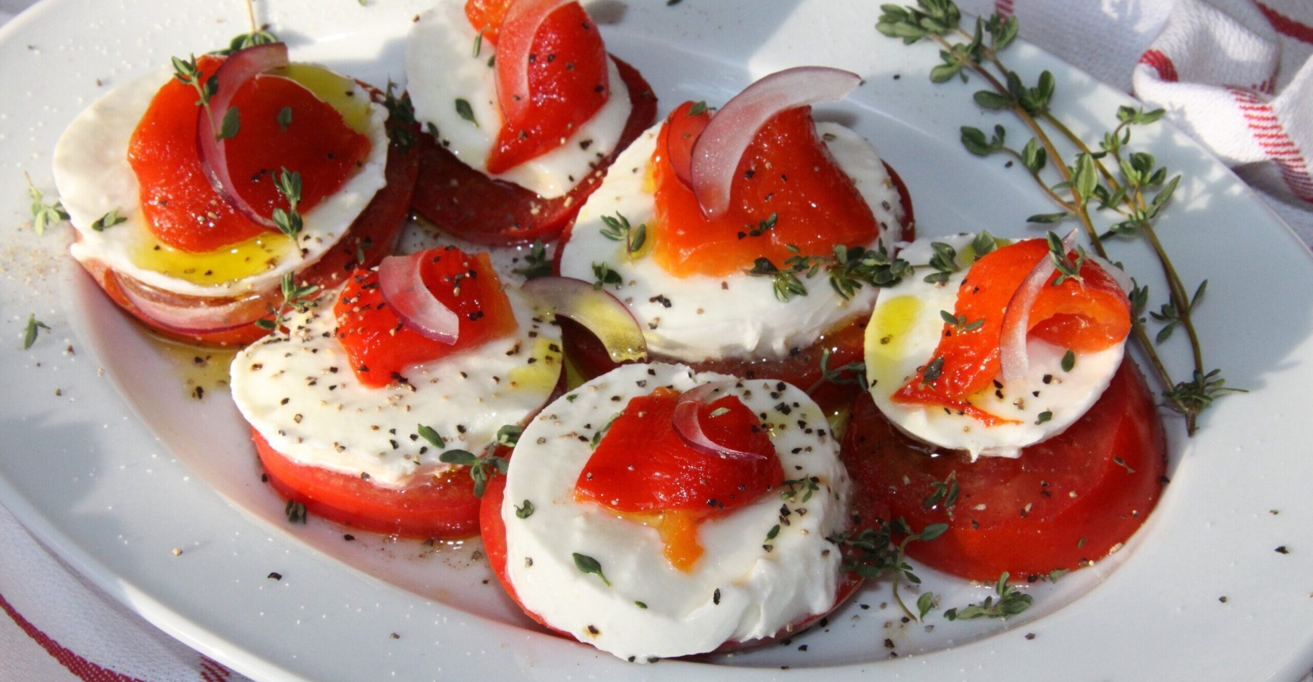 Tomatoes, mozzarella, roasted bell pepper.