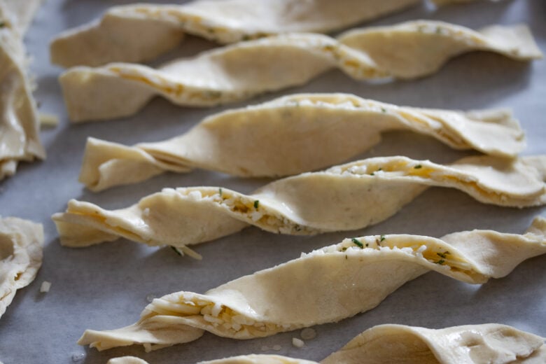 cheese and rosemary breadsticks before entering hte oven