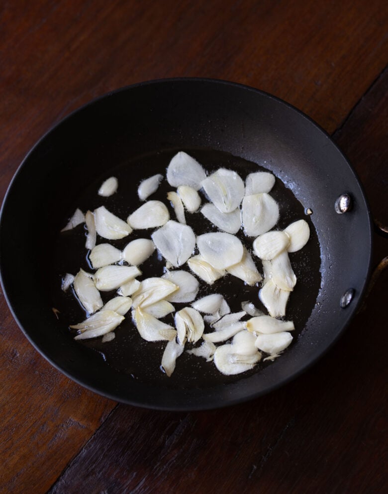 garlic slivers in a small skillet