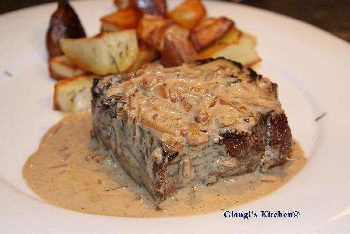 pan seared New York steak with whiskey and cream