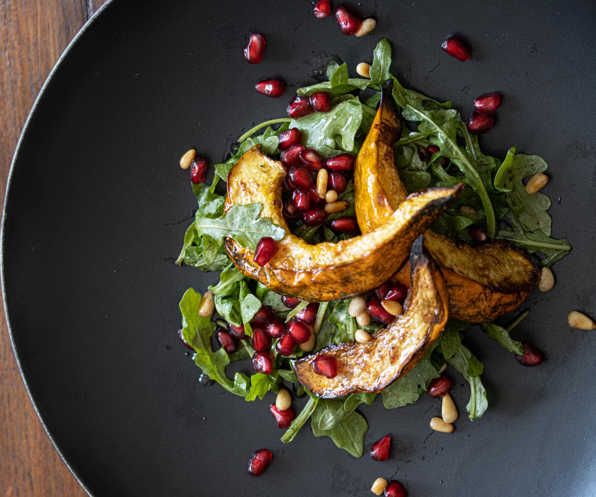 Pomegranate Seeds, Acorn Squash Arugula Salad