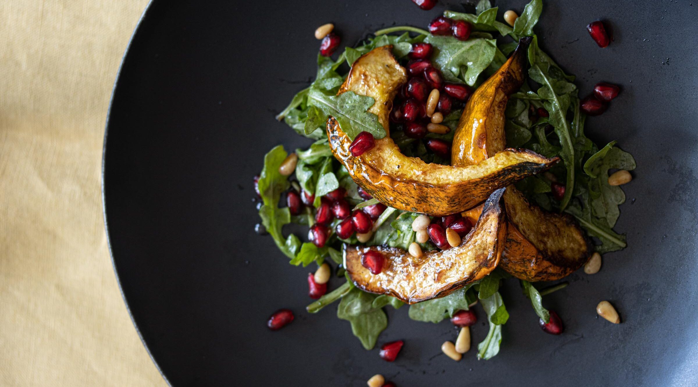 pomegranate acorn squash arugula salad