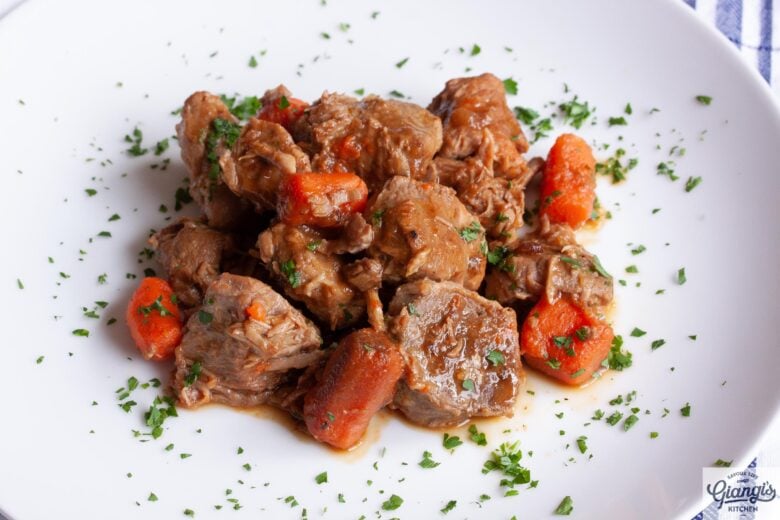 pork stew shoulder in a white serving plate