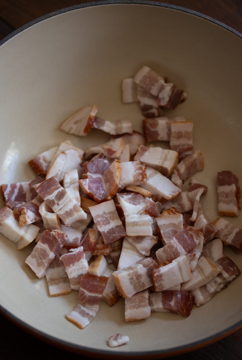 cut bacon pieces in Dutch oven pot