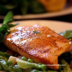 seared salmon with peas, potatoes and mint