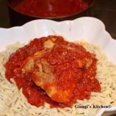 spaghetti rigati with chicken and tomato sauce