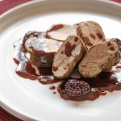 pomegranate, blackberries sauce with pork tenderloin