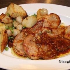 white balsamic pork chops with roasted potatoes and peas